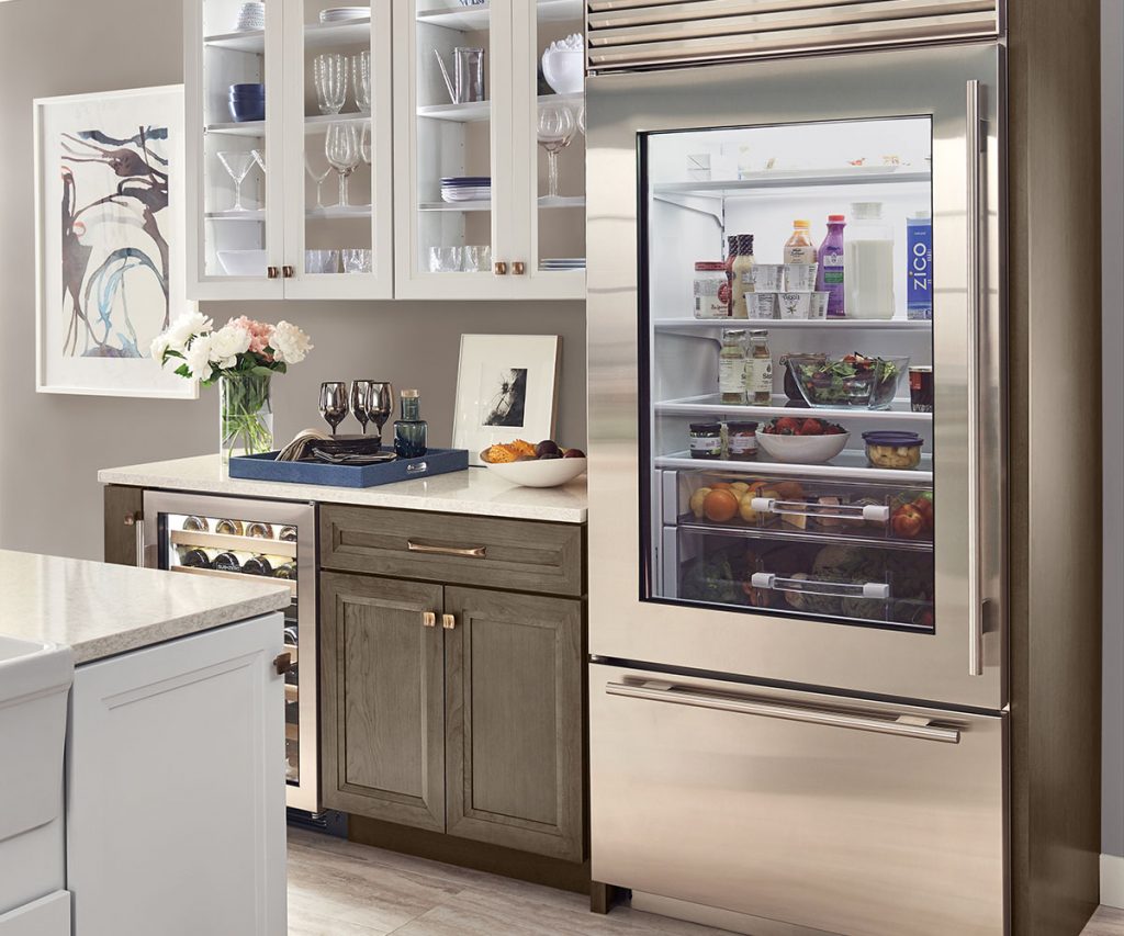 Kitchen with a Sub-Zero glass door fridge