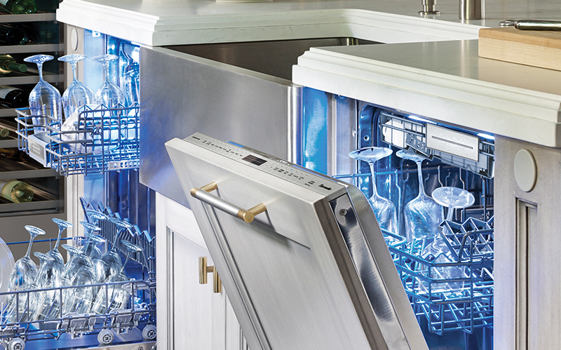 Two Thermador Star Sapphire Dishwashers open with dishes