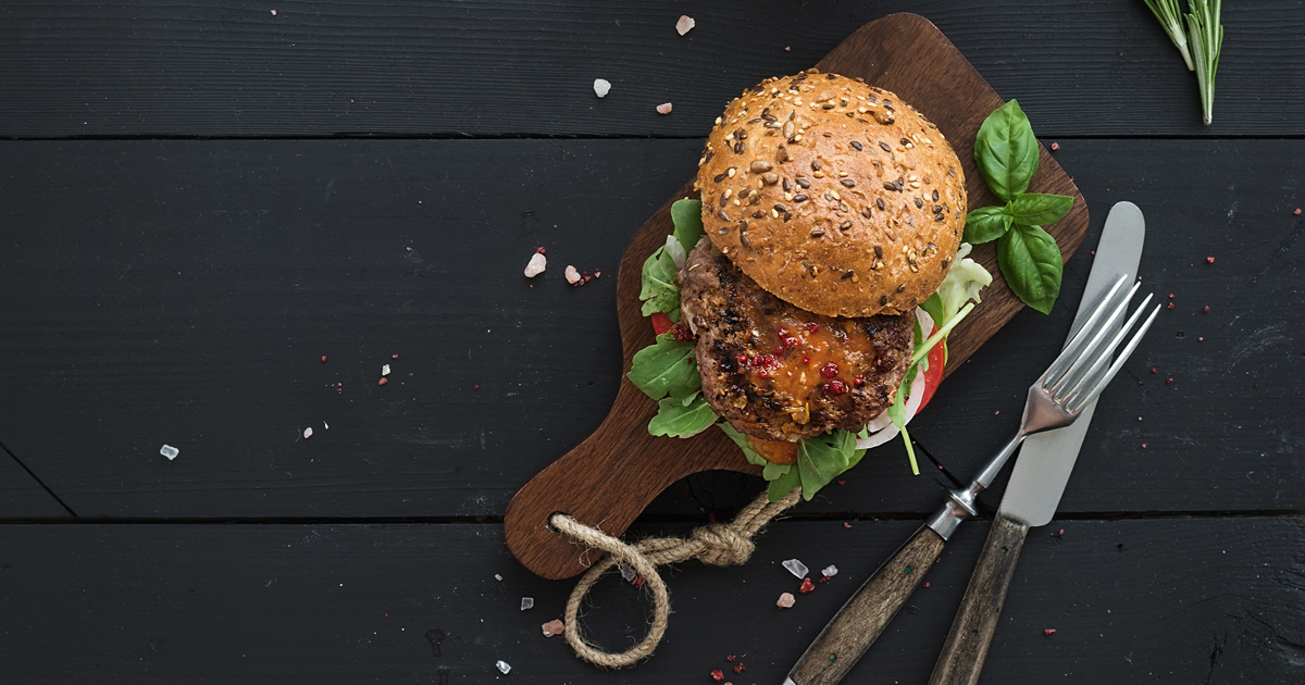 Fancy hamburger on black table