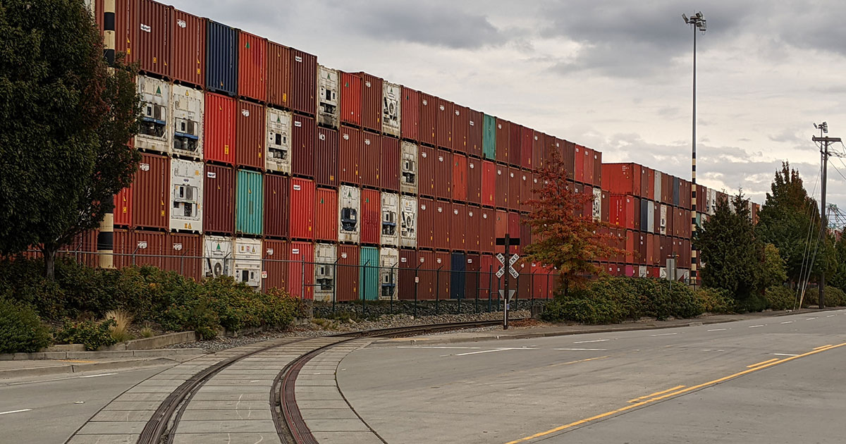 shipping containers along a railroad