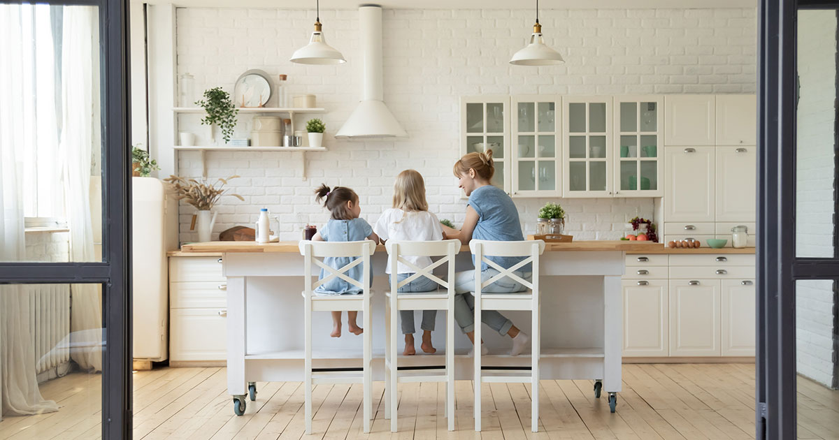 mom and daughters preparing food